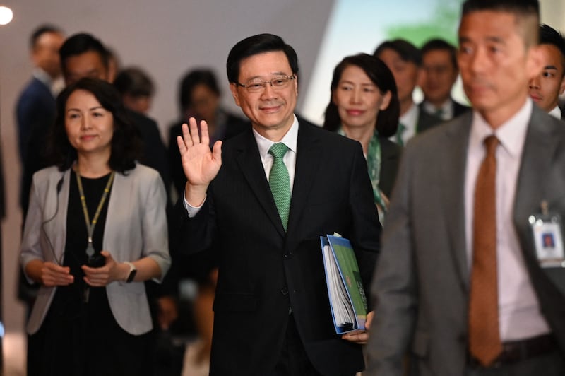 Hong Kong chief executive John Lee waves to the media as he arrives at central government offices to deliver his annual policy address on Wednesday this week. Photograph: Peter Parks/AFP via Getty Images