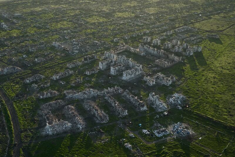 Residential buildings razed to the ground and shell craters in the town of Maryinka in May 2023. Photograph: AP