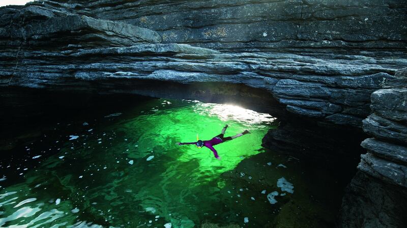 Snorkelling at Solomon’s Hole: this excursion is more memorable for its remarkable geology than its underwater life.   Photograph: Gareth McCormack