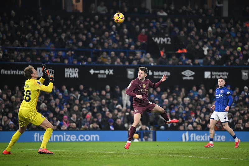 James McAtee scores for Manchester City. Photograph: Justin Setterfield/Getty Images