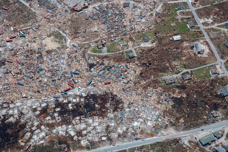 In this image released by US Customs and Border Protection, Air and Marine Operations agents conduct search and rescue operations in Abaco Island and Marsh Harbour, Bahamas. Photograph: Kris Grogan/US Customs and Border Protection/AFP/Getty