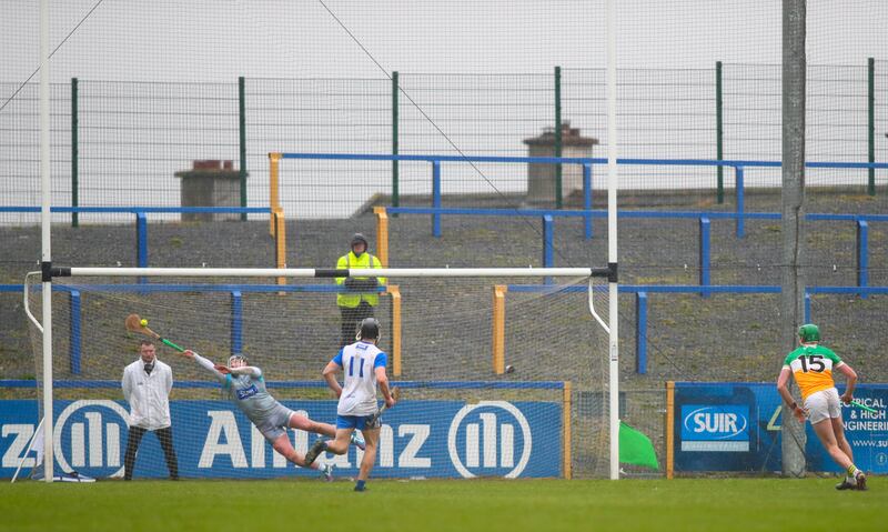 Waterford's Billy Nolan saves a penalty by Offaly's Brian Duignan. Photograph: Ken Sutton/Inpho