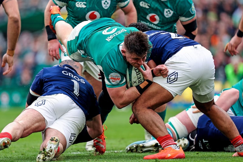 Ireland's Dan Sheehan is tackled by France's Jean-Baptiste Gros and Peato Mauvaka. Photograph: Ben Brady/Inpho