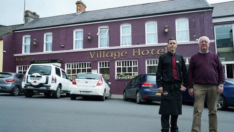 Father and son Terry and Terry McKevitt outside their McKevitt’s Village Hotel in Carlingford. Photograph: Enda O’Dowd