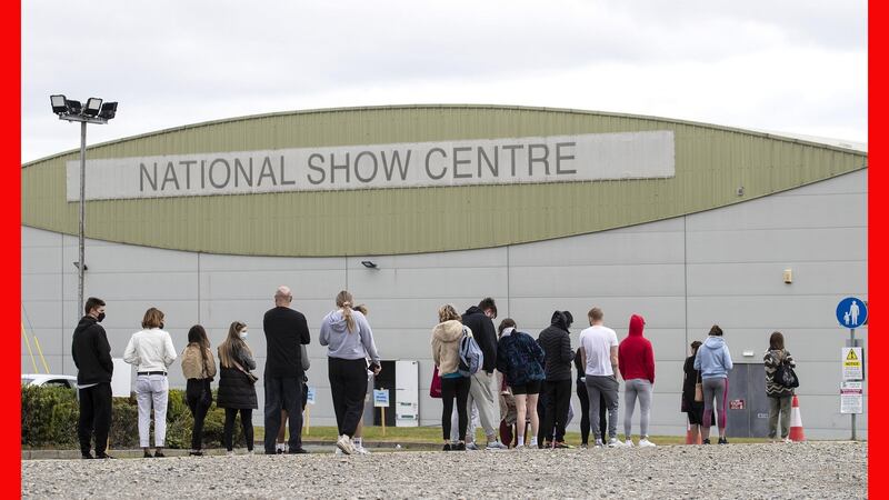 People queue outside a walk-in vaccination centre at the National Show Centre in Swords, Dublin, on Sunday.  Photograph: Damien Eagers/PA Wire