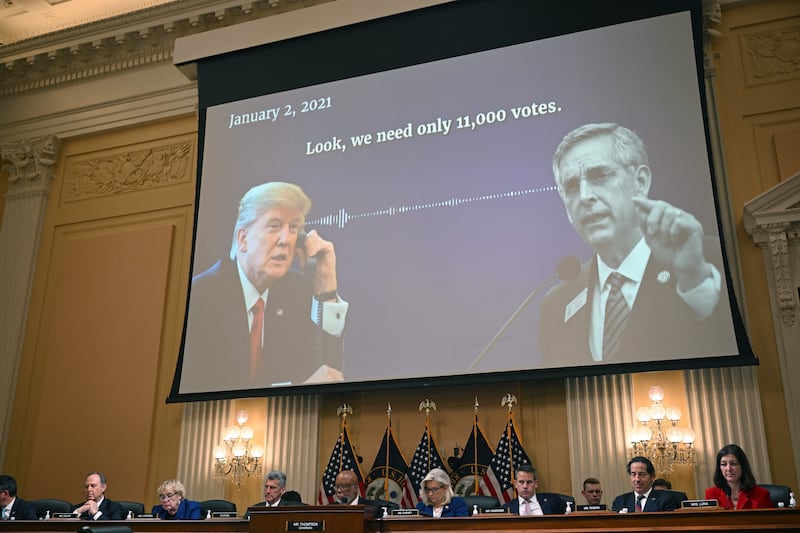 An audio recording of Donald Trump talking to Georgia secretary of state Brad Raffensperger is played during a US House Select Committee hearing in October 2022. Photograph: Mandel Ngan/AFP via Getty Images