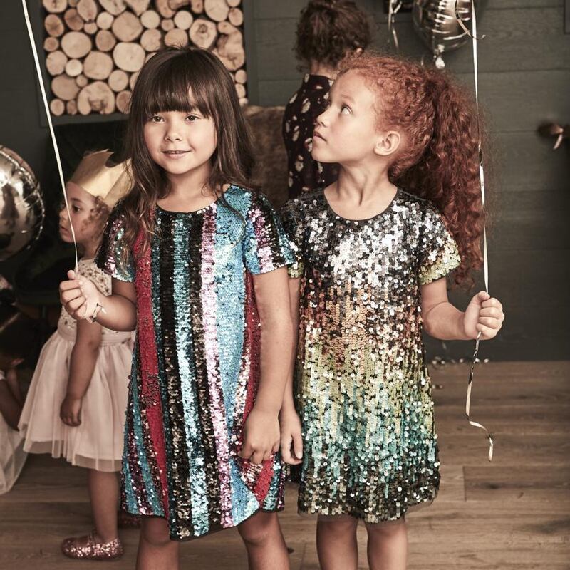 Sequin stripe party dress (3-16 years) €51-€59; mint ombre sequin shift dress (3-16 years) €51-€59; both from Next