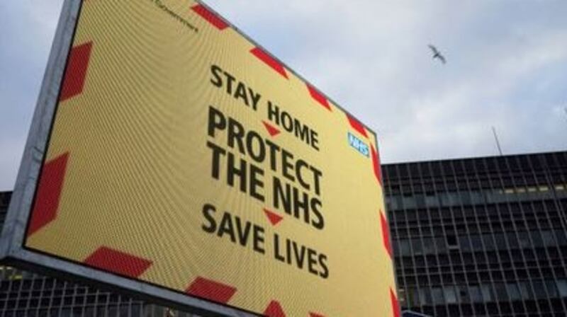 A sign gives out coronavirus pandemic information to visitors and staff outside the Royal Liverpool University Hospital. The UK announced a new lockdown following a sharp increase of cases driven in part by a new variant of the virus, which has since been found in the Republic. Photograph: Getty