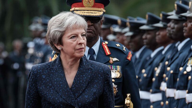 Theresa May reviews a military guard of honour at the State House in Nairobi on August 30th. Photograph: Asuyoshi Chiba/AFP/Getty Images