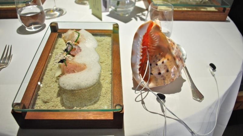 The famous “Taste of the Sea” dish created by chef Heston Blumenthal  in which the meal arrives on a plate, accompanied by a conch shell in which sits an iPod and headphones so you hear the sound of the sea as you eat the dish.