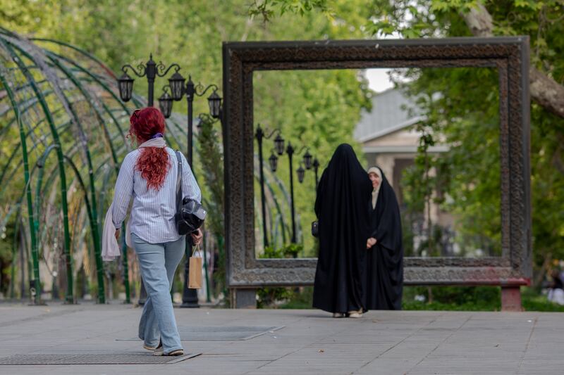 Women by the Ferdows Garden in Tehran, Iran, where the work of documenting women’s rights abuses is being impacted by the US aid freeze. Photograph: Arash Khamooshi/New York Times
                      