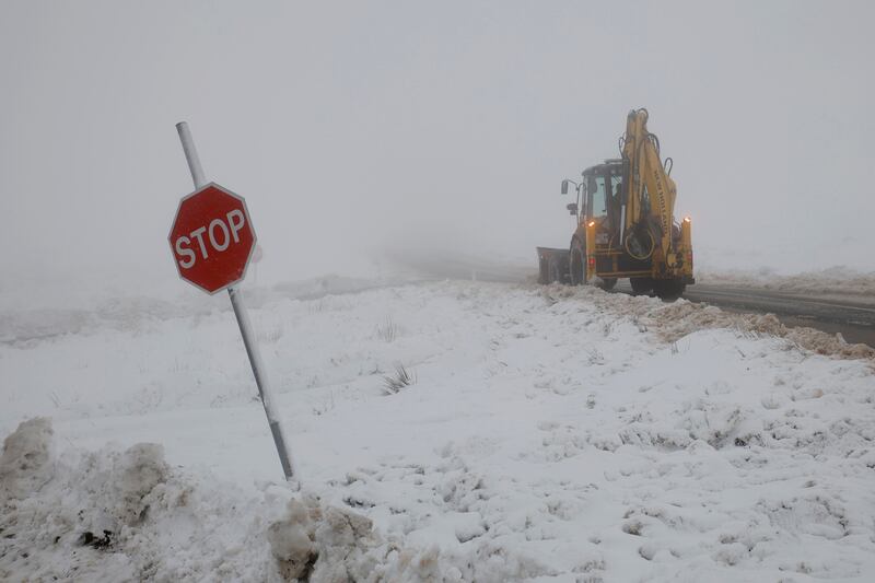 Local man Pat Kenny clears the roads around the Wicklow Gap, a job he has been doing since the 1970s. Photograph: Nick Bradshaw/The Irish Times