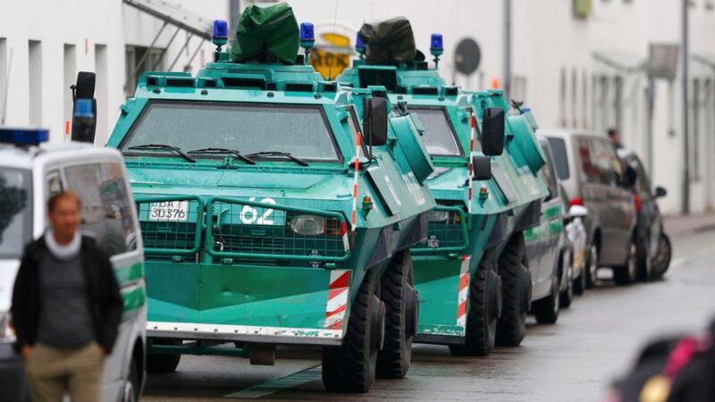 Police said there was no sign of a connection with Dr Merkel’s visit to the town. Photograph: Michael Dalder/Reuters