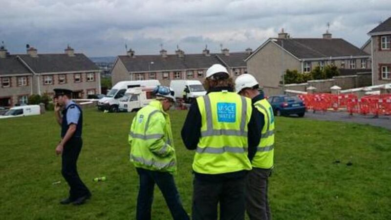 Gardaí and Irish Water contractors at the Ashbrook Estate in Togher, Cork where  residents and protesters are protesting against the installation of water meters.  Photograph: Alan Healy Evening Echo via Twitter