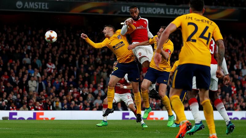 Arsenal striker Alexandre Lacazette  heads home his side’s goal in the Europa League semi-final first leg against Atlético Madrid at the Emirates Stadium. Photograph: Eddie Keogh/Reuters