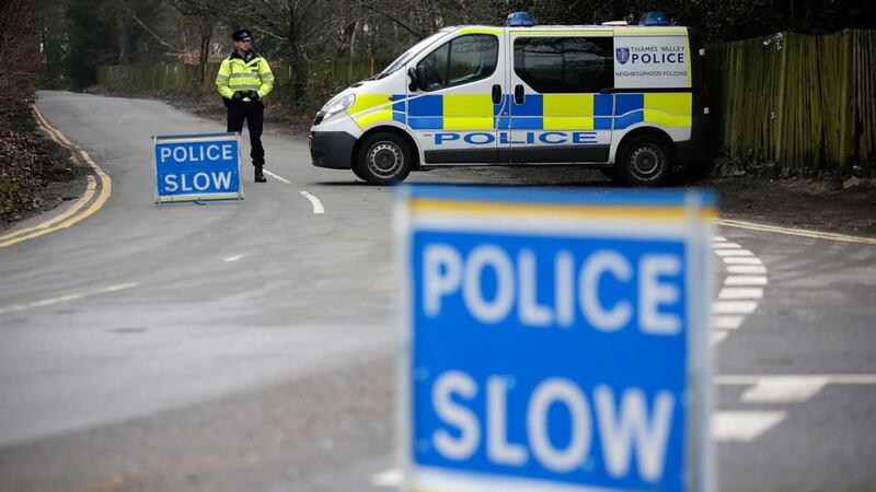 Roadblock: police guard the road leading to Boris Berezovsky’s estate after his body was discovered. Photograph: Matthew Lloyd/Getty