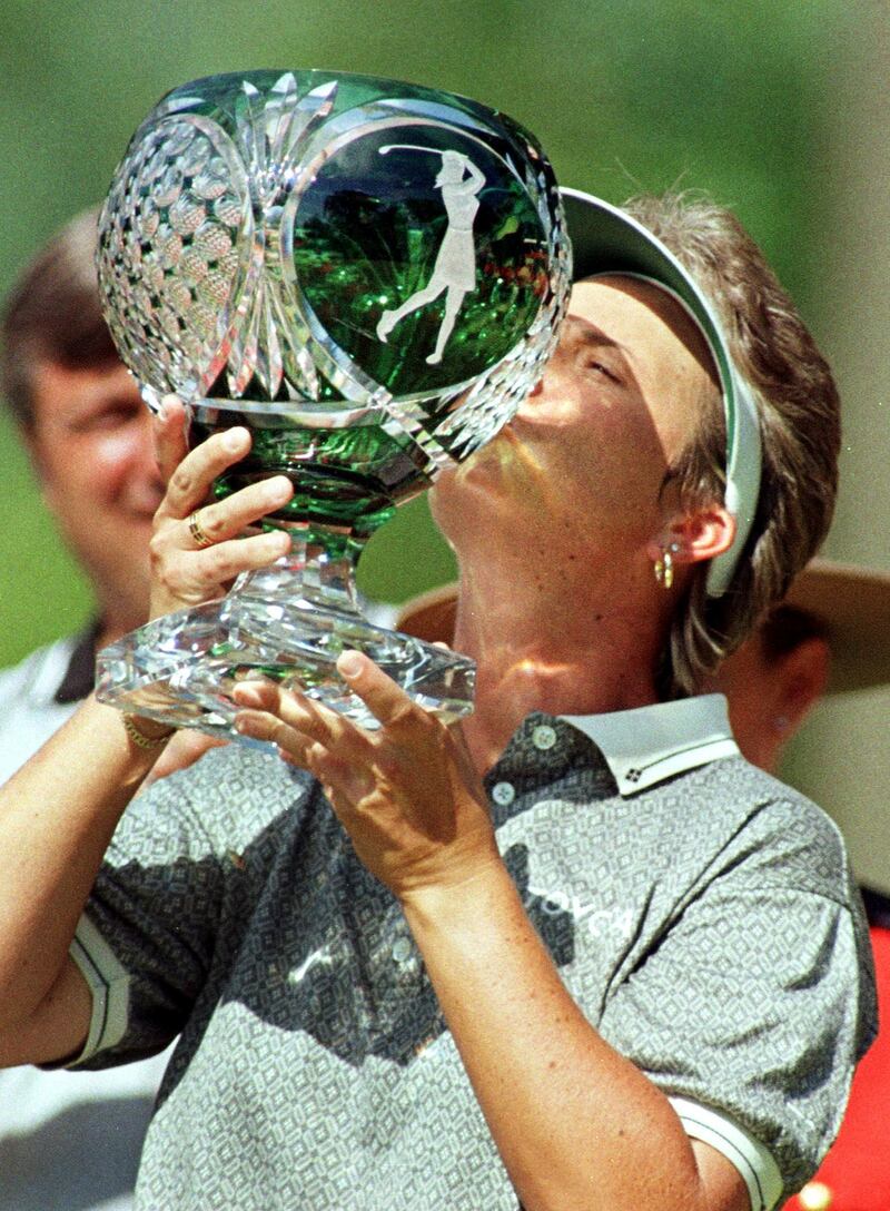 Brandie Burton with the Du Maurier Classic trophy after it was presented to her at the Essex Golf and Country Club in LaSalle, Ontario. Photograph: Andrew Cutraro