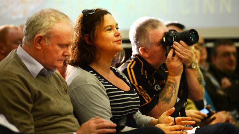 Northern Ireland Deputy First Minister Martin McGuinness and Sinn Féin deputy leader Mary Lou Mc Donald listening to Gerry Adams address party  members  during a conference at the Red Cow Hotel in Dublin today. Photograph: Cyril Byrne/The Irish Times.