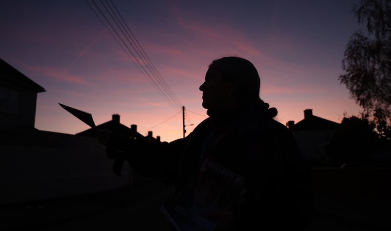 PBP candidate in Dublin South Central, Cllr. Hazel De Nortúin canvassing at dusk in Ballyfermot. Photo: Bryan O’Brien

