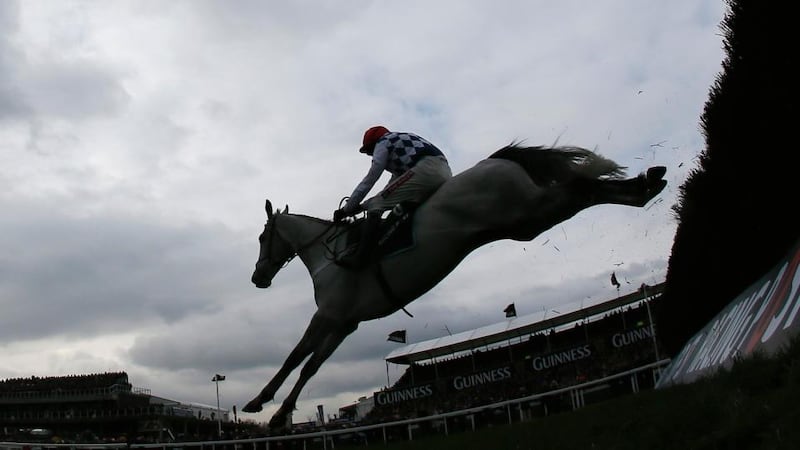 Barry Geraghty on Simonsig jumps the last fence to go on and win the Arkle Challenge Trophy Steeple Chase. Photograph: Stefan Wermuth/Reuters