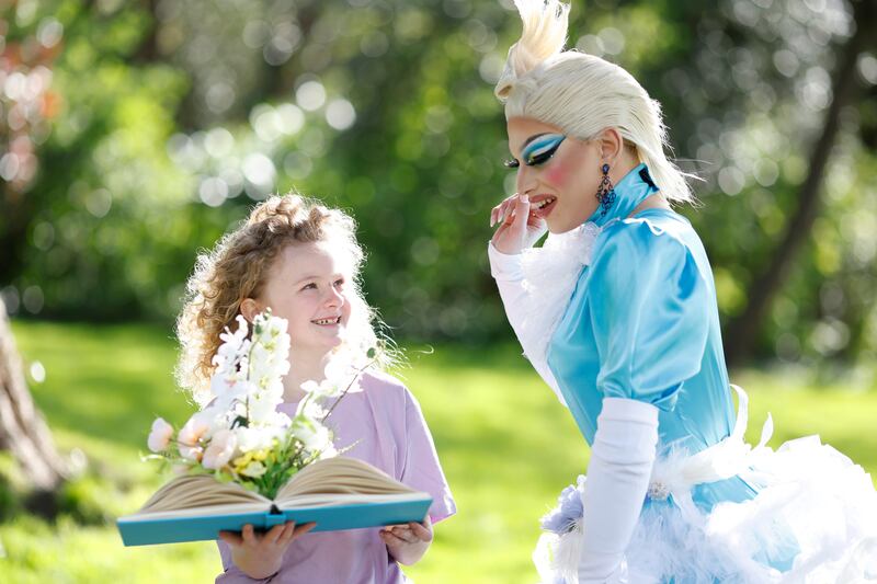 Eliza Geoghegan (9) and drag queen Vicky Voltz kick off the International Literature Festival Dublin 2024. Photograph: Julien Behal Photography