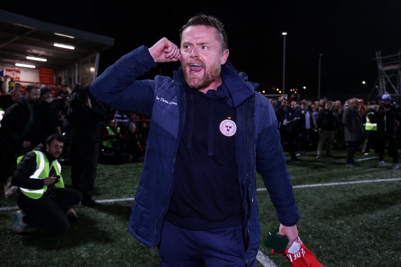 Damien Duff celebrates winning the title with the Shelbourne fans after victory over Derry at The Brandywell. Photograph: Ben Brady/Inpho