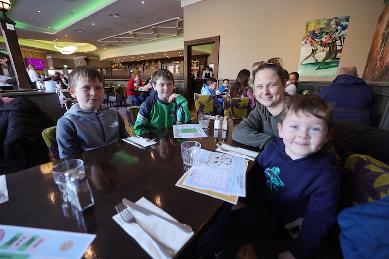 Deirdre Fitzgerald with her sons Cillian (4), Dara (12) and Jack (11) from Monagea, Co Limerick, at the Longcourt Hotel in Newcastle West on Thursday. Photograph: Alan Betson/The Irish Times