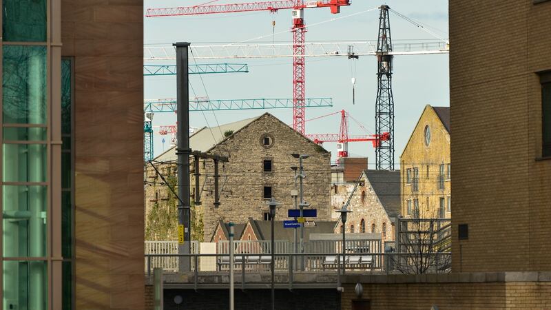 Construction work on Grand Canal Docks, Dublin: workers returning home experience difficulty securing a job, low wages and precarious short-term contracts. Photograph: NurPhoto/Getty Images