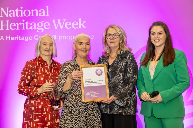 Mags O’Sullivan, representing Cork Traveller Women’s Network, receives the Inclusive Heritage Award 2024 from Heritage Council chief executive Virginia Teehan and council chairperson Dr Martina Moloney, with National Heritage Week Awards ceremony MC Síle Seoige