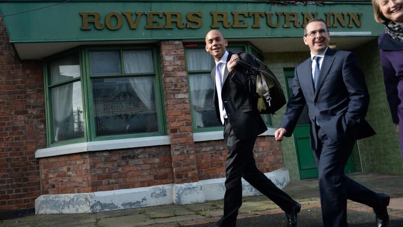 Members of the British Labour Party’s shadow cabinet Chuka Umunna, Owen Smith and Labour Deputy Leader Harriet Harman, walk past the Rovers Return Inn, the Coronation Street set ahead of Labour Party leader Ed Miliband’s speech at his party’s manifesto in Manchester. Photograph: Andy Rain/EPA