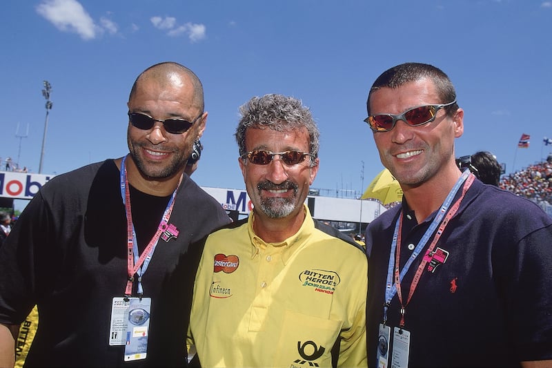 Eddie Jordan with Republic of Ireland internationals Paul McGrath and Roy Kean at the 2001 French GP. Photograph: Clive Mason /Allsport