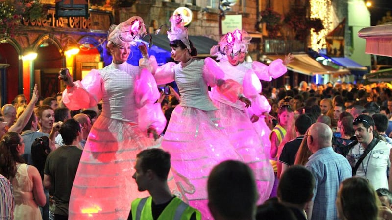 Stilt walking Members of The Wrong Size performing their Lightwalkers show on the streets of Galway  as part of Galway Arts Festival. Photograph: Joe O’Shaughnessy