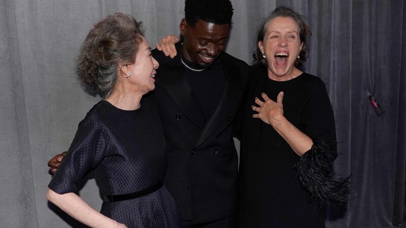 Acting winners  Yuh-Jung Youn (left), Daniel Kaluuya and Frances  McDormand at Union Station in Los Angeles. Photograph: Chris Pizzello/AFP