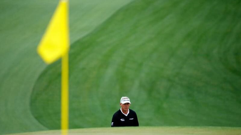 Darren Clarke makes his way up the ninth fairway towards the elevated green during a practice round before the US Masters tournament at the Augusta National Golf Club yesterday. Photograph: Mike Blake/Reuters  Darren Clarke makes his way up the ninth fairway towards the elevated green during a practice round before the US Masters tournament at the Augusta National Golf Club yesterday. Photograph: Mike Blake/Reuters