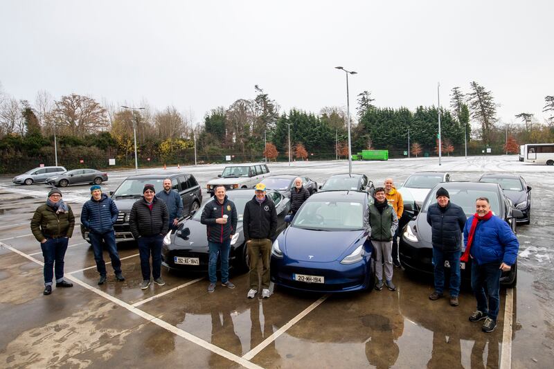 Drivers from the Telsa Owner Ireland group and Helping Irish Home have come together to find homes for Ukrainian refugees who are arriving in Ireland. Photograph: Tom Honan 