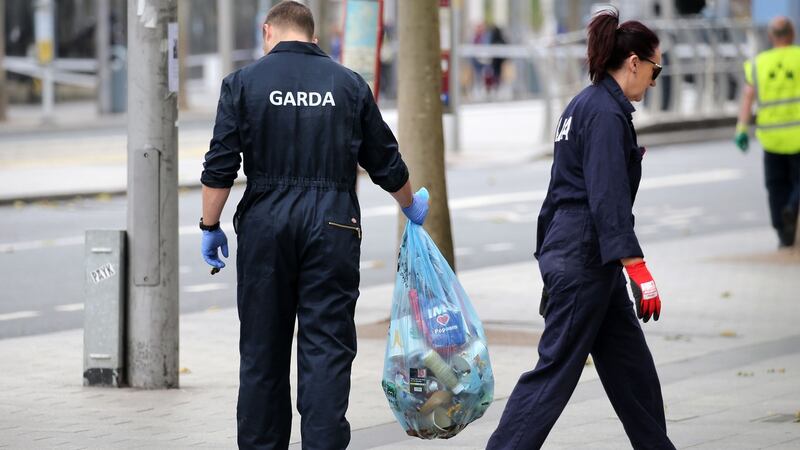 Gardaí at the scene of Tuesday morning’s fatal stabbing on O’Connell Street in Dublin. Photograph by Crispin Rodwell for the Irish Times