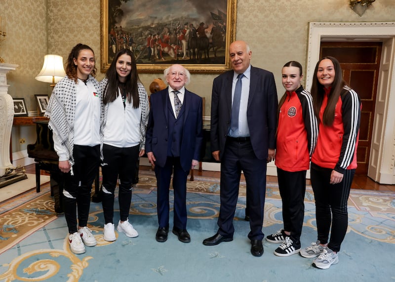 President Michael D Higgins with the president of the Palestinian FA Jibril Al Rajoub; Palestinian players Mira Natour and Jeniver Shattara; and Bohs players Savanagh Kane and Rachel Kelly. Photograph: Maxwells