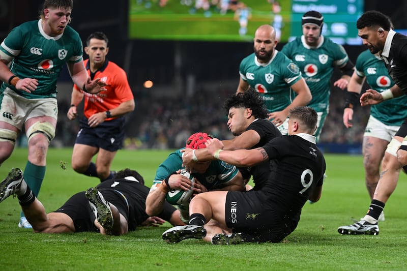 Josh van der Flier of Ireland burrows over to score the first try. Photograph: Charles McQuillan/Getty