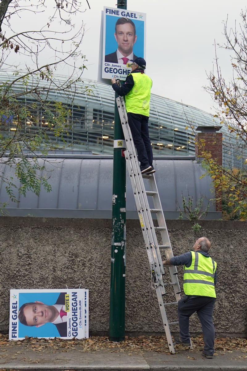 Election posters are erected on Shelbourne Road in Dublin on Friday. Photograph: Brian Lawless/PA