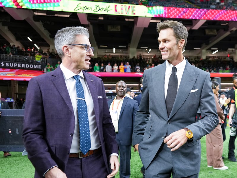 Fox's Kevin Burkhardt and Tom Brady before kick-off at the Caesars Superdome in New Orleans. Photograph: Doug Mills/The New York Times
                      