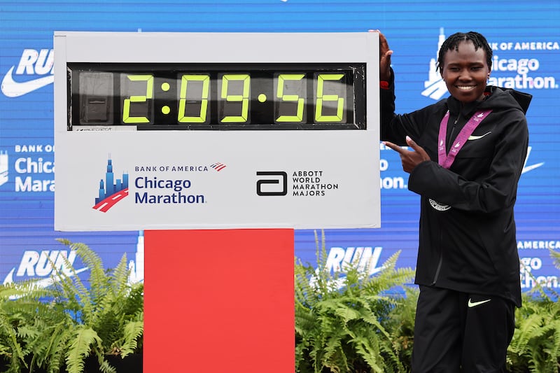 Ruth Chepngetich with a clock after her Chicago success. Photograph: Michael Reaves/Getty Images