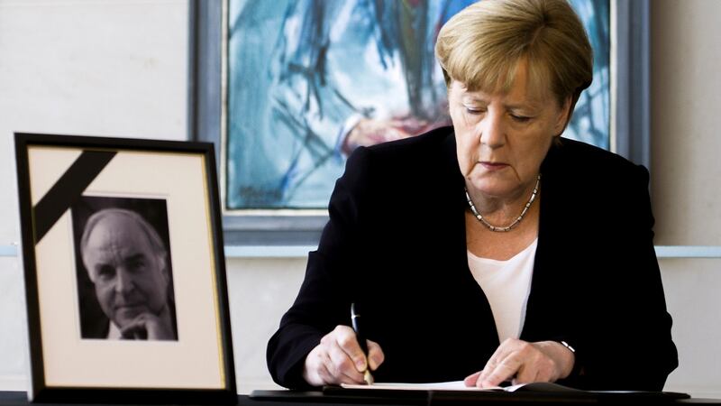 German chancellor  Angela Merkel: She and thousands of ordinary Germans expressed their condolences to the Kohl family, and respect for the man whose political decisions changed their lives forever. Photograph: Carsten Koall/EPA