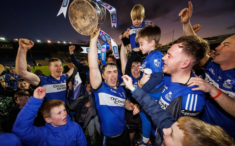 Sarsfields’ Conor O'Sullivan celebrates with the trophy after the Cork club claimed their first Munster title by beating favourites Ballygunner at FBD Semple Stadium, Thurles. Photograph: James Crombie/Inpho 