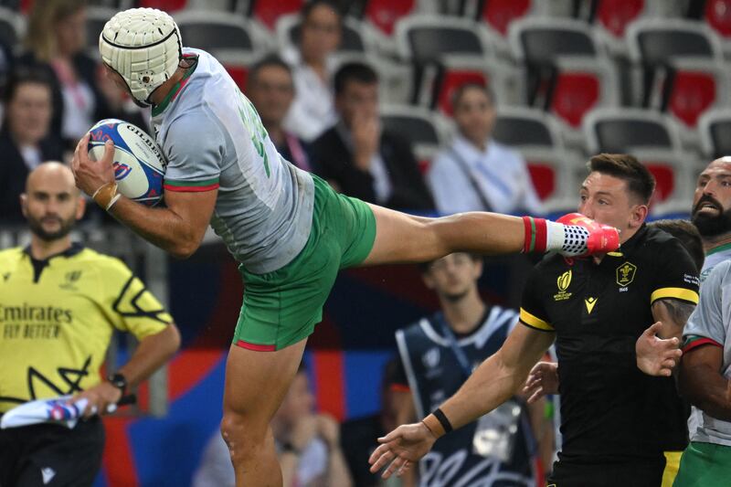 Portugal's Vincent Pinto kicks Josh Adams of Wales in the face while catching a ball during the Pool C game. Photograph: Nicolas Tucat/AFP via Getty Images