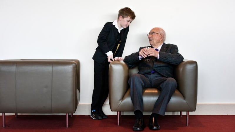 Dr Whitaker  with his grandson Conor, aged 10, from Rathmines. Photograph: Brenda Fitzsimons