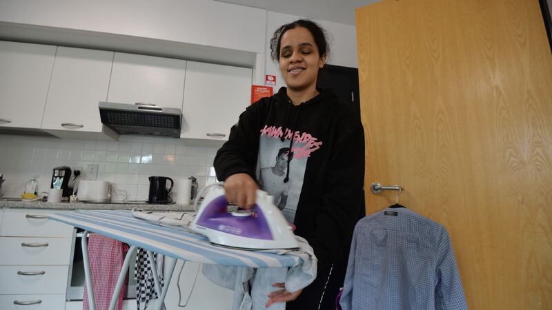 Victoria Alves de Oliveire ironing at a residential summer camp run by the National Council for the Blind Ireland. Photograph: Alan Betson / The Irish Times