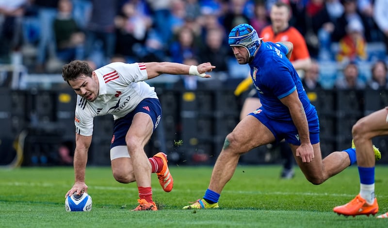 France's Antoine Dupont crosses for a try in Rome. Photograph: Matteo Ciambelli/Inpho