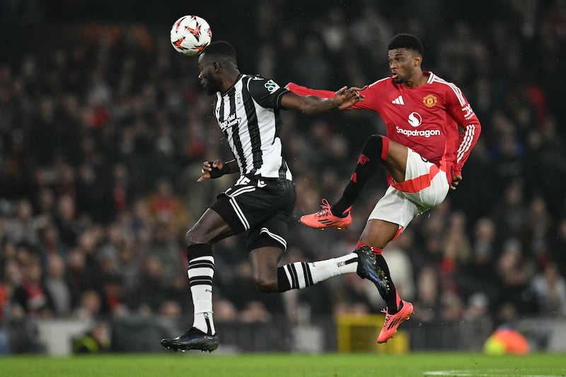 Paok's Omar Colley challenges Manchester United's Amad Diallo. Photograph: Oli Scarff/AFP via Getty Images