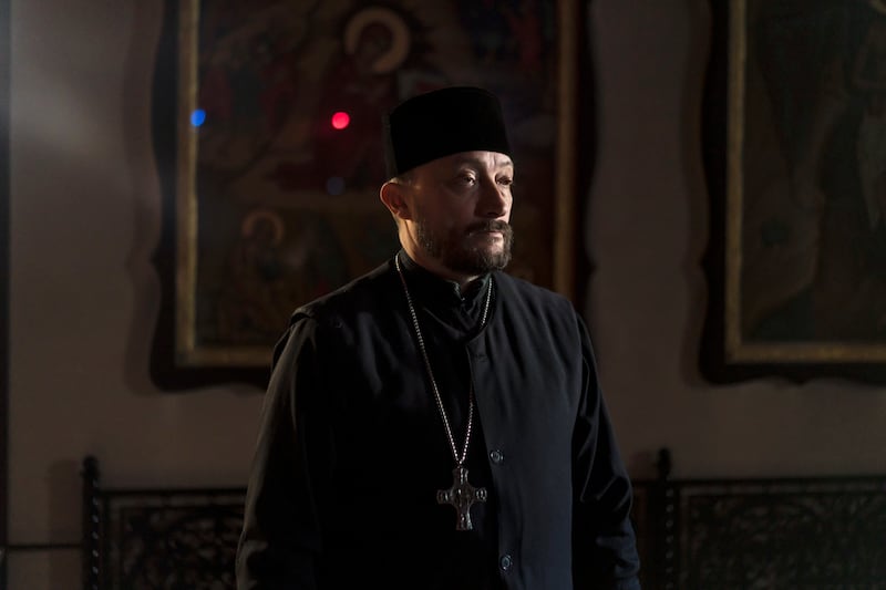 The Rev Andriy Halavin, an Orthodox priest, at the Church of St Andrew in Bucha, Ukraine. Photograph: Brendan Hoffman/New York Times
                      