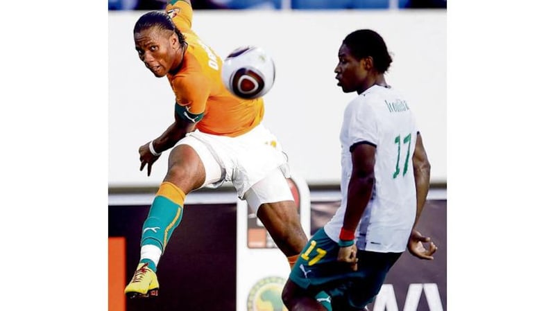 Didier Drogba fires in a shot against Burkina Faso yesterday.